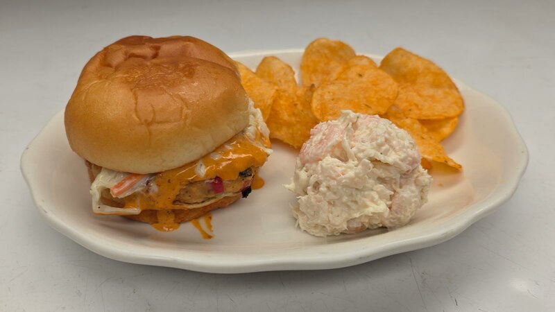 Salmon Burger with side of potato chips