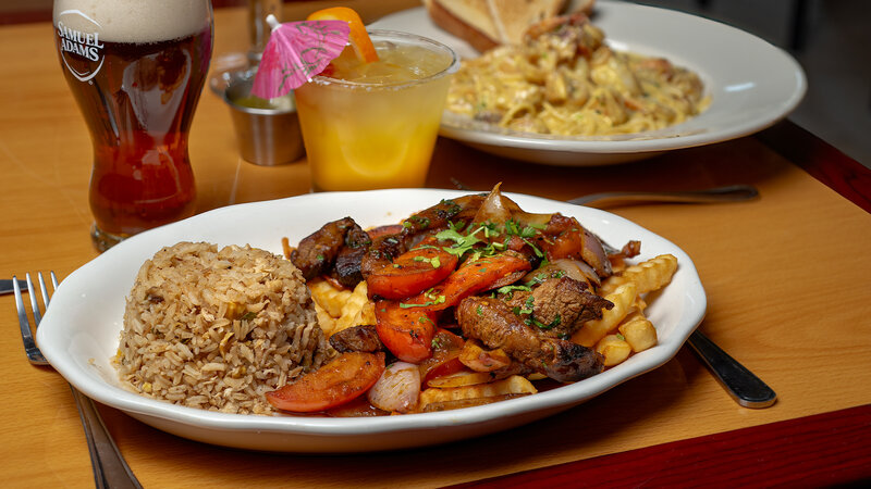 Meat platter with french fries and rice
